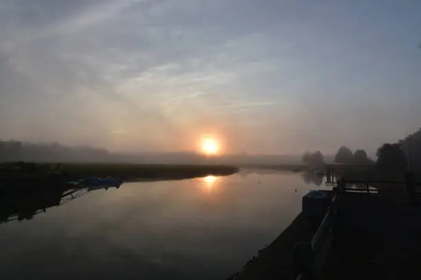 Beautiful Duxbury bay at sunrise on a foggy morning.