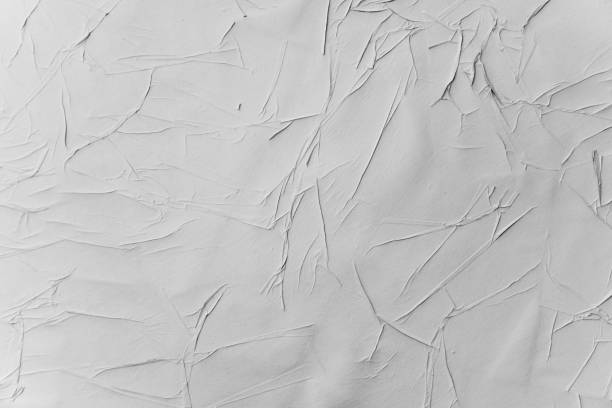 istock Crumpled creased posters grunge paper textures. 1140627781