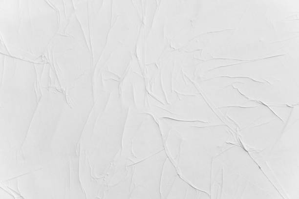 istock Crumpled creased posters grunge paper textures. 1140627874