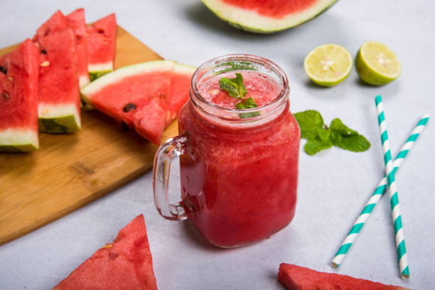 watermelon smoothie in a jar - watermelon melon fruit juice imagens e fotografias de stock