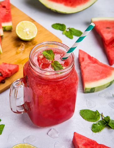 Iced Fresh Watermelon Smoothie In A Jar With Slices