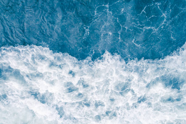 istock Pale blue sea wave during high summer tide, abstract ocean background 1140630453