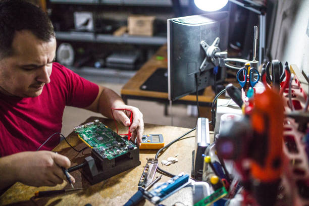 istock Technician repairing laptop 1140632269