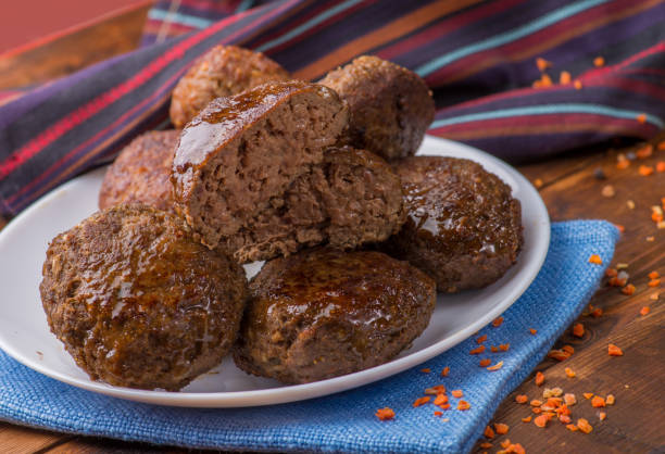 istock cutlet cut in half on the background whole on a plate 1140634153