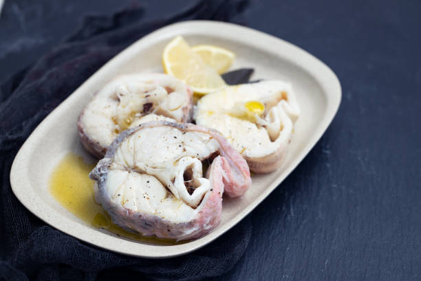istock boiled fish with lemon and olive oil 1140639620