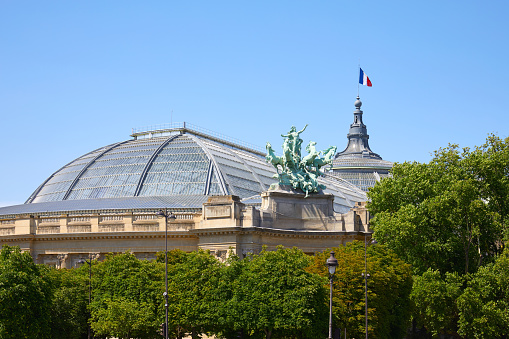 Paris, France - July 21, 2017: Grand Palais building in a sunny summer day, clear blue sky in Paris, France.
