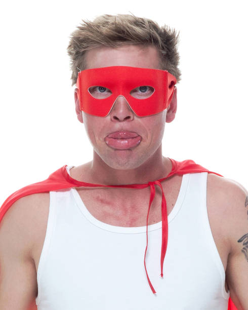 istock Man wearing pajamas and super hero cape 1140647143