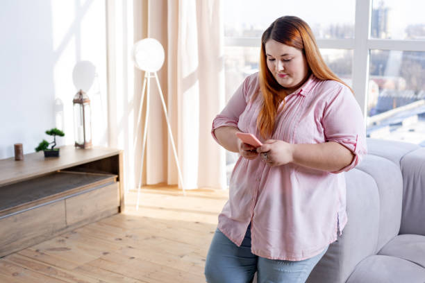 istock Pleasant good looking woman chatting on social networks 1140647320