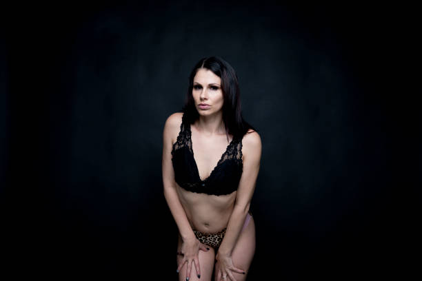istock Beautiful female in front of black background 1140650220