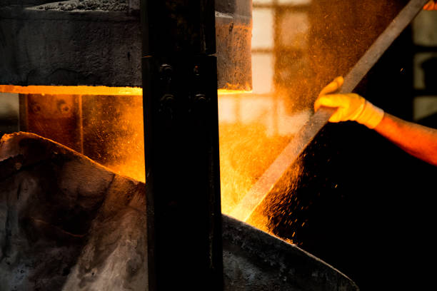 istock metal casting process with red high temperature fire in metal part factory 1140653578