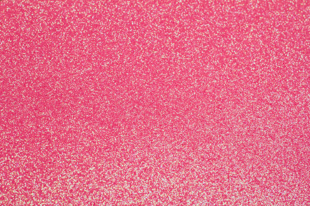 istock pink glittering background closeup 1140653847