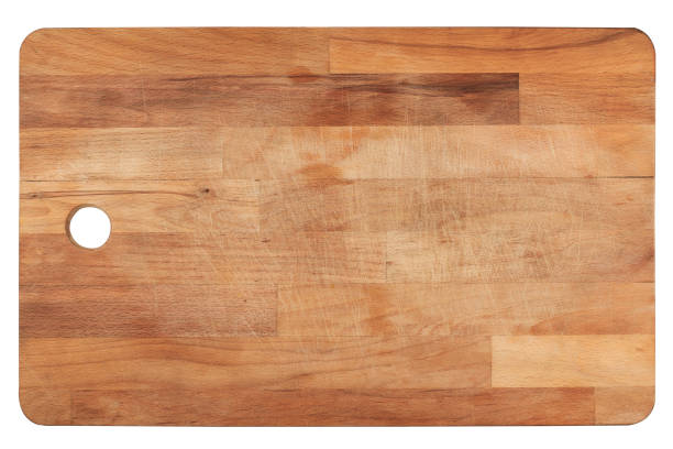 kitchen wooden cutting board on white top view closeup of used wooden kitchen cutting woodboard isolated on white background cutting board stock pictures, royalty-free photos & images