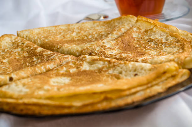 istock Russia, Severodvinsk, a stack of homemade Russian pancakes in the form of a triangular envelope, selective focus 1140654176