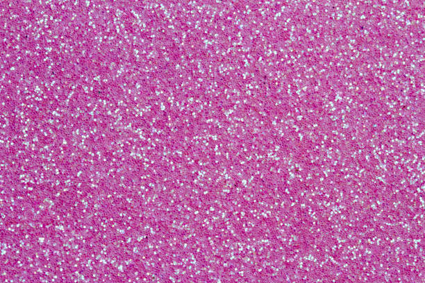 istock pink glittering background closeup 1140655460