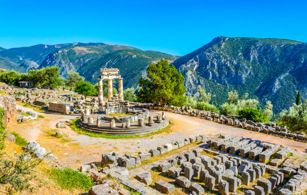 Ruins of temple of Athena Pronaia at Delphi, Greece Ruins of temple of Athena Pronaia at Delphi, Greece oracle building stock pictures, royalty-free photos & images