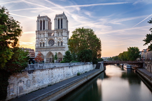 Cathedral of Notre Dame front view at dramatic dawn – Paris, France