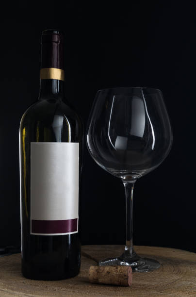 istock Red wine glasses and bottle. 1140662988