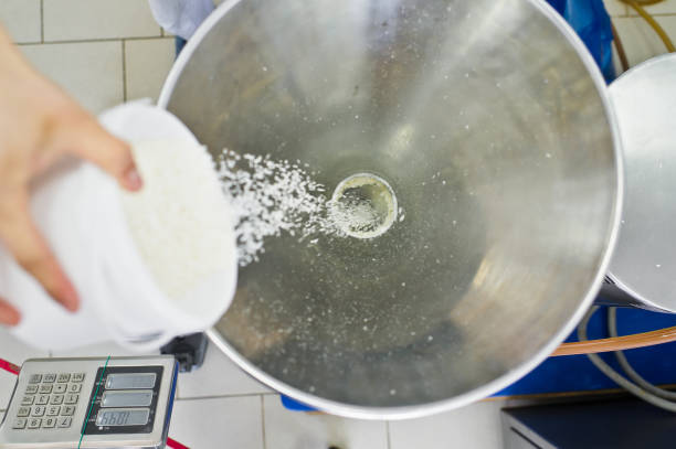 istock work sleeps coconut chips in an industrial crusher - press. Food production 1140668459