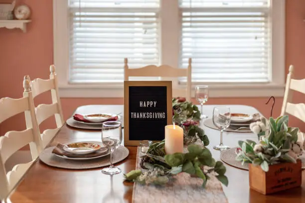 Thanksgiving dining table with letterboard sign - Happy Thanksgiving