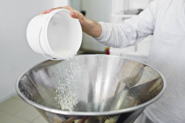 istock work sleeps coconut chips in an industrial crusher - press. Food production 1140671532