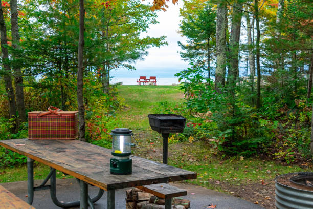 istock Fall campsite with view of lake 1140672612