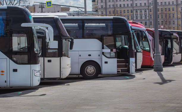 istock buses on parking on the background of cloudy sky 1140680202