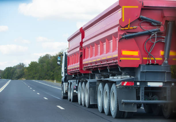 istock Dump Truck goes on country highway 1140680251