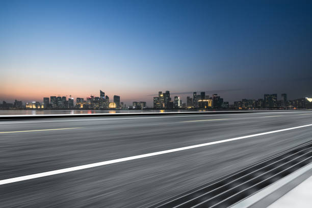 istock Empty asphalt road through modern city in Hangzhou, China. 1140684105