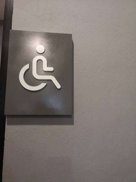 istock Disabled toilet sign symbol on the wall 1140689795