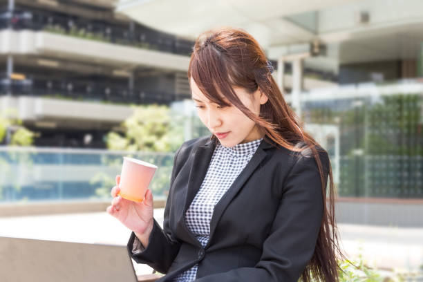 istock Young Businesswoman Using Laptop Computer Outside 1140694606