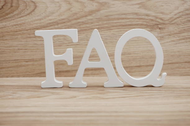 istock FAQ word alphabet letters on wooden background 1140697257