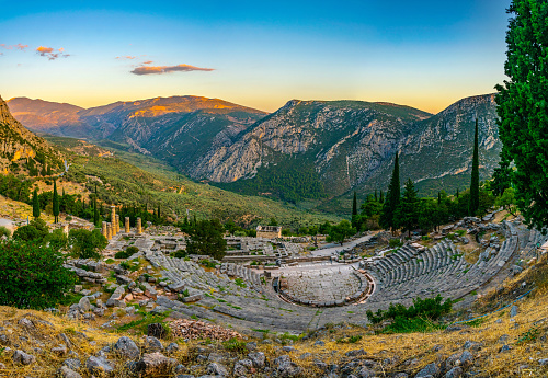 Sunset view of ruins of theatre at ancient Delphi, Greece