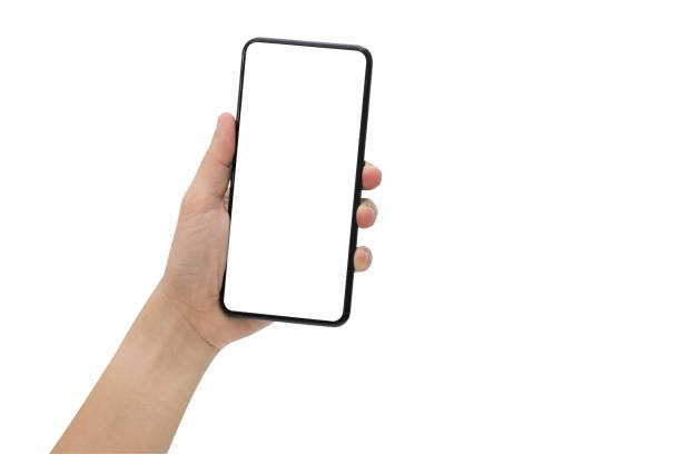istock Hand holding black mobile phone with blank screen isolated on white 1140698749