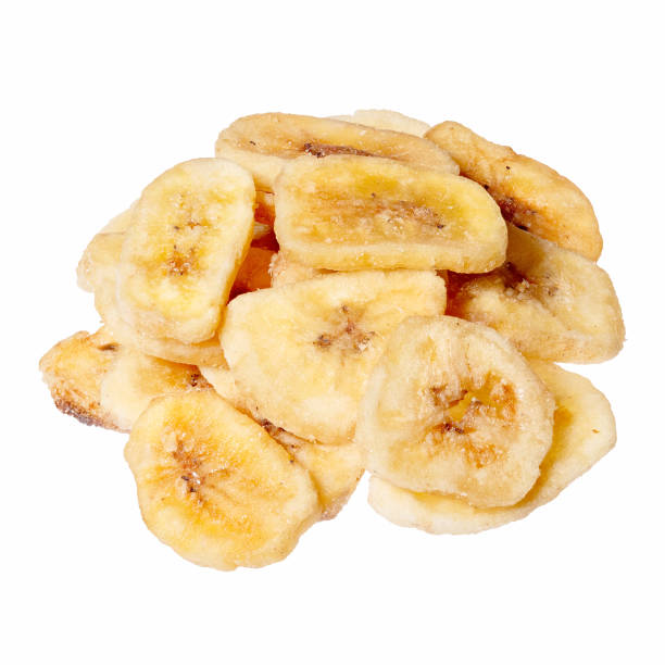 istock Banana chips isolated on white, close up. 1140720014