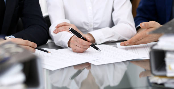istock Bookkeepers team or financial inspectors  making report, calculating or checking balance. Group of people at work. Business operations concept 1140722082