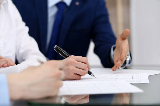 istock Bookkeepers team or financial inspectors  making report, calculating or checking balance. Group of people at work. Business operations concept 1140722091