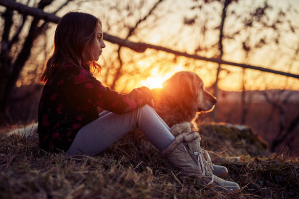 istock Two friends enjoying sunset / sunrise time in nature. 1140724145