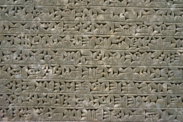 istock Ancient cuneiform from Babylon in Mesopotamia. Assyrian and Sumerian writing carved on clay or stone. 1140725149