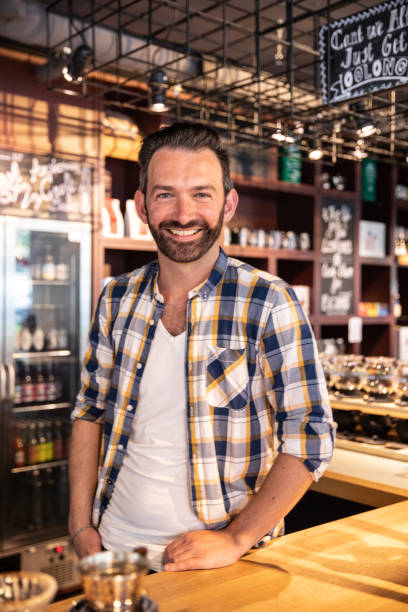 istock Portrait of a man smiling in a cafe 1140725973