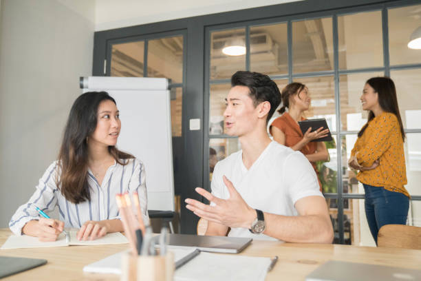 istock Asian young people business meeting 1140738947