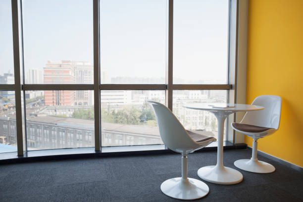 istock Meeting table with chairs in modern office 1140743064