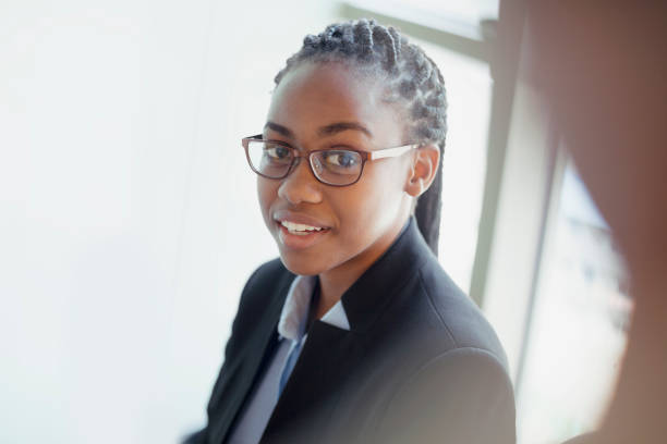 istock Woman speaking with colleague in office 1140743720