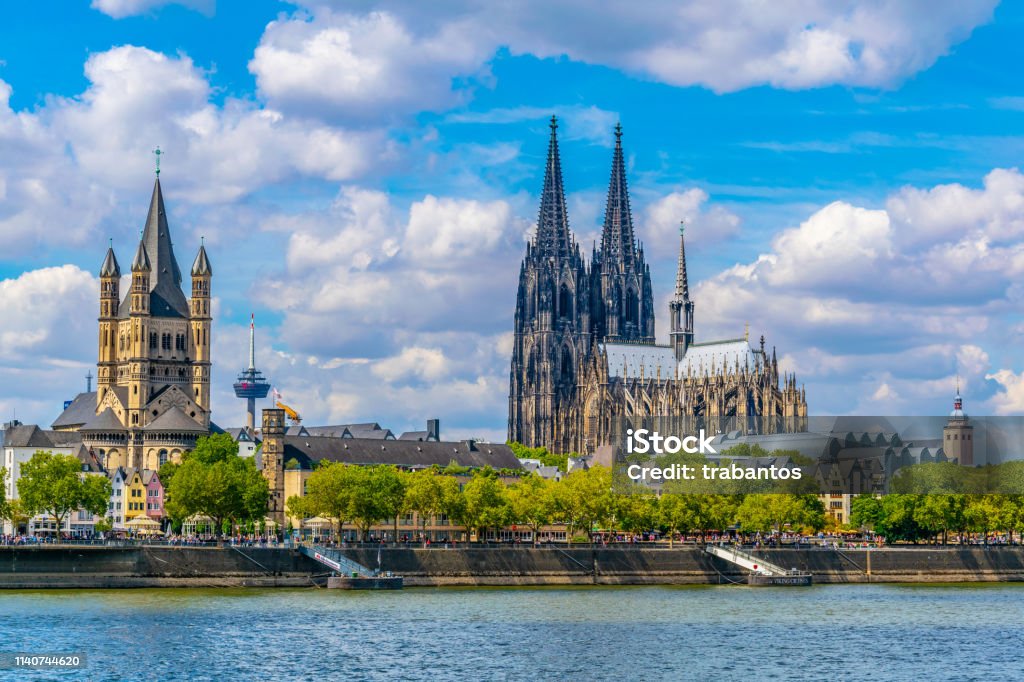 Cityscape of Cologne with Hohenzollern bridge, cathedral and Saint Martin church, Germany Cologne Stock Photo