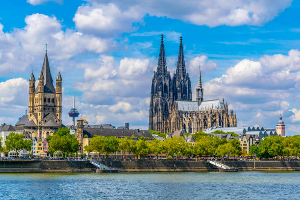 Cityscape of Cologne with Hohenzollern bridge, cathedral and Saint Martin church, Germany Cityscape of Cologne with Hohenzollern bridge, cathedral and Saint Martin church, Germany rhine river photos stock pictures, royalty-free photos & images