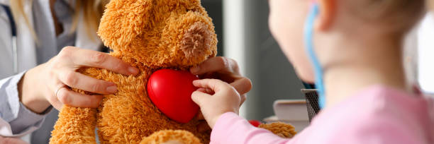 istock Little child at pediatrician reception listen 1140746175