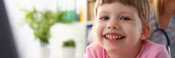 istock Little child at pediatrician reception 1140746177