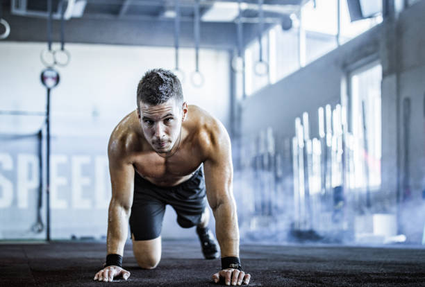 istock Sweaty male athlete having cross training in a gym. 1140747922