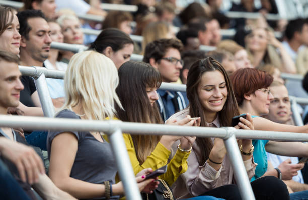 istock Sport Fans Cheering On Tribunes 1140749131