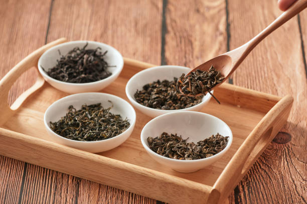 istock Green tea on wooden spoon 1140749282