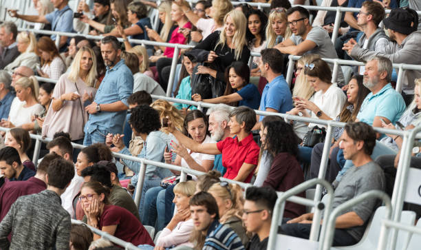 istock Sport Fans Cheering On Tribunes 1140749287